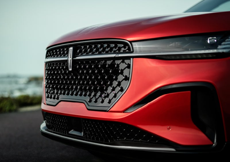 The sleek grille of a 2024 Lincoln Nautilus® SUV with the available Jet Appearance Package makes a bold statement. | Varsity Lincoln in Novi MI